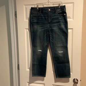 Straight leg crop jeans with small rip knees